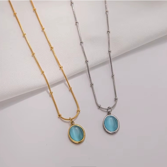 Anthropologie Jewelry - Elegant Stainless Steel Silver Necklace with Blue Pendant